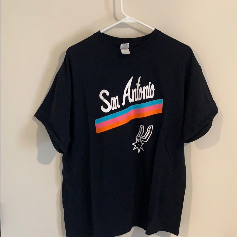 Pre owned Spurs game given Fiesta T-shirt